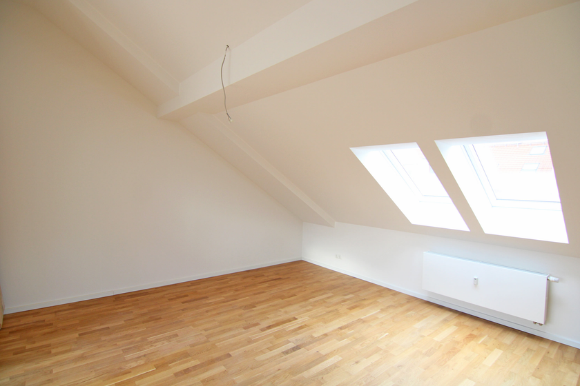 Wohnzimmer mit offener Küche