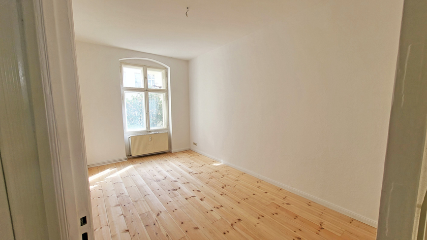 Atmosphärischer Altbauklassiker mit Dielen und EBK - tolle Lage Radickestraße! - Foto 5