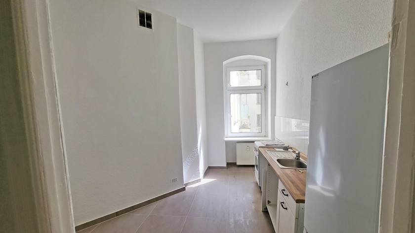 Atmosphärischer Altbauklassiker mit Dielen und EBK - tolle Lage Radickestraße! - Photo 4