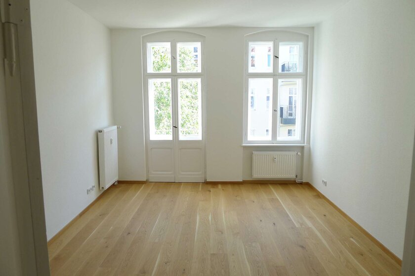 Atmosphärischer Altbauklassiker mit Dielen und EBK - tolle Lage Radickestraße! - Foto 1