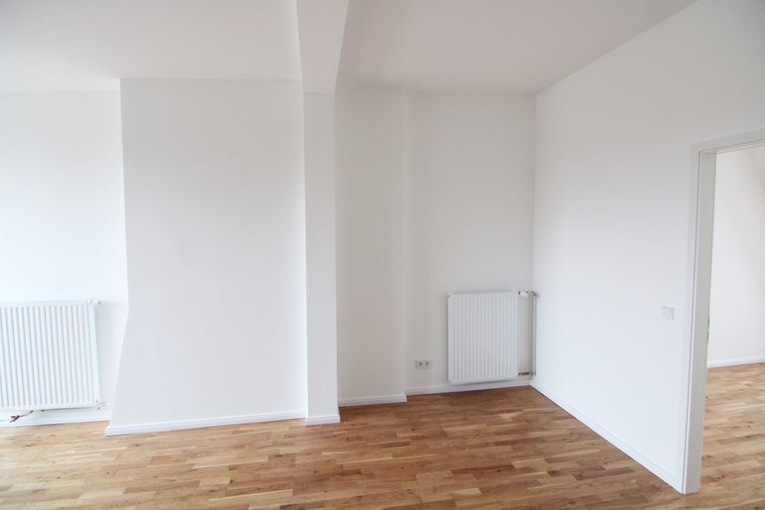 Wohnzimmer mit offener Küche