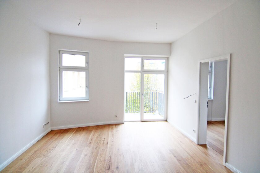 Atmosphärischer Altbauklassiker mit Dielen und EBK - tolle Lage Radickestraße! - Foto 1