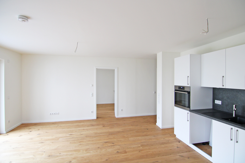 Großes Wohnzimmer/offene Küche