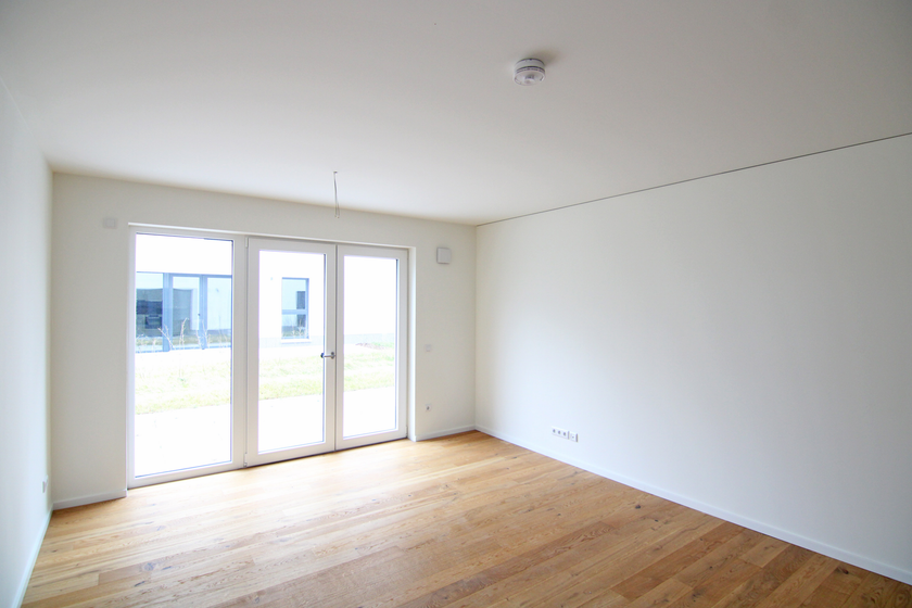 Wohnzimmer mit Süd-Terrasse