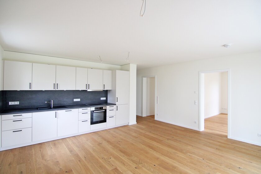 Bildschöne, modernisierte Altbauwohnung mit Parkett, EBK und 2 Balkonen! - Foto 5