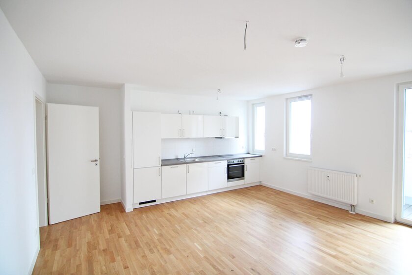 Wohnzimmer mit offener Küche Wohnzimmer mit offener Küche