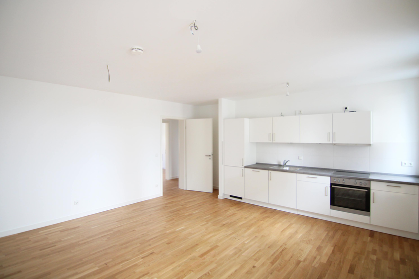 Wohnzimmer mit offener Küche Wohnzimmer mit offener Küche