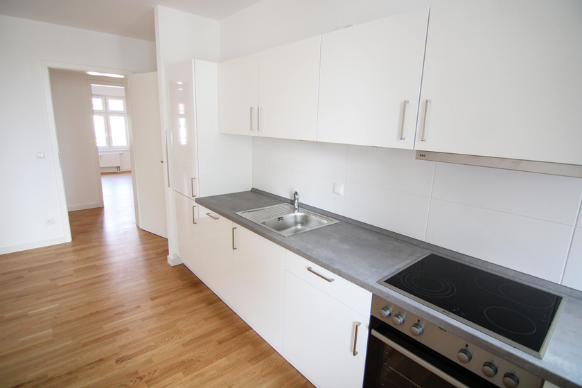 Wohnzimmer mit offener Küche Wohnzimmer mit offener Küche